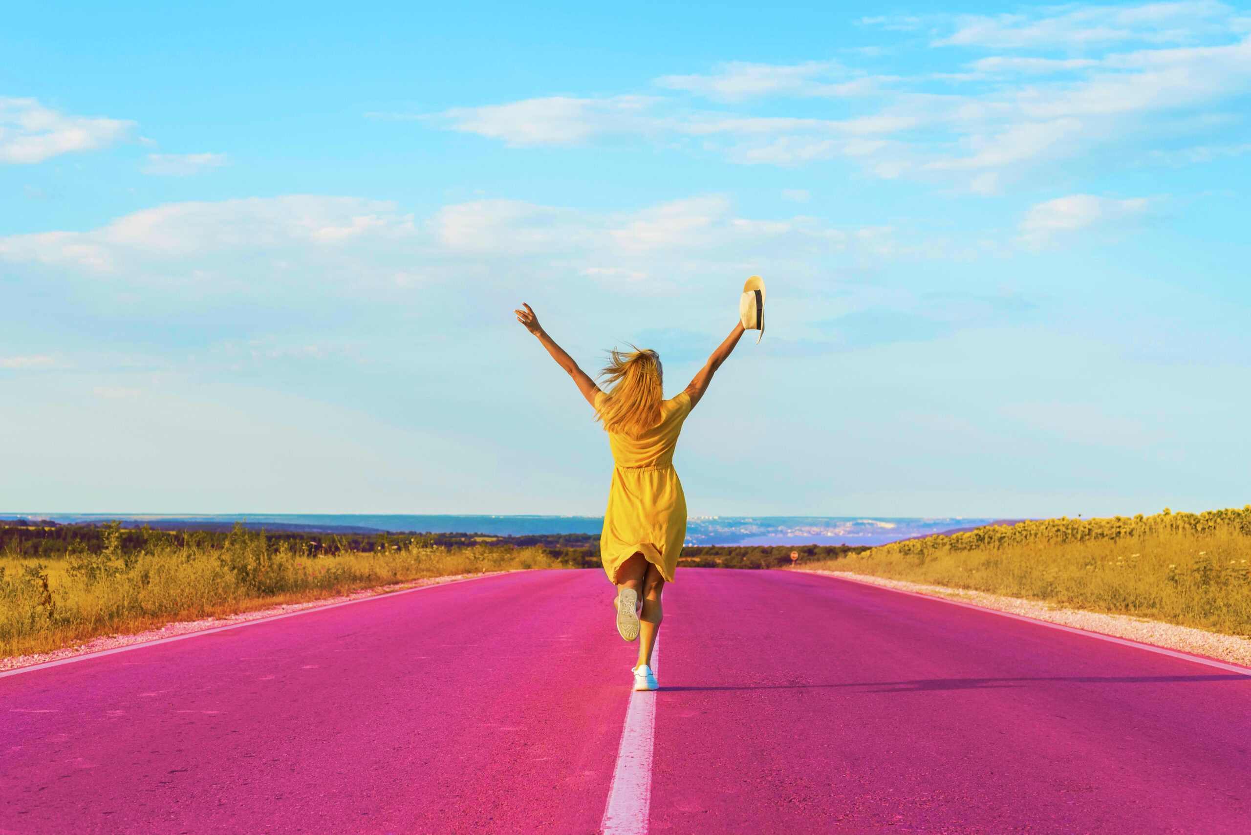 Youth running joyfully down a vibrant pink road, symbolizing freedom, self-discovery, and career momentum