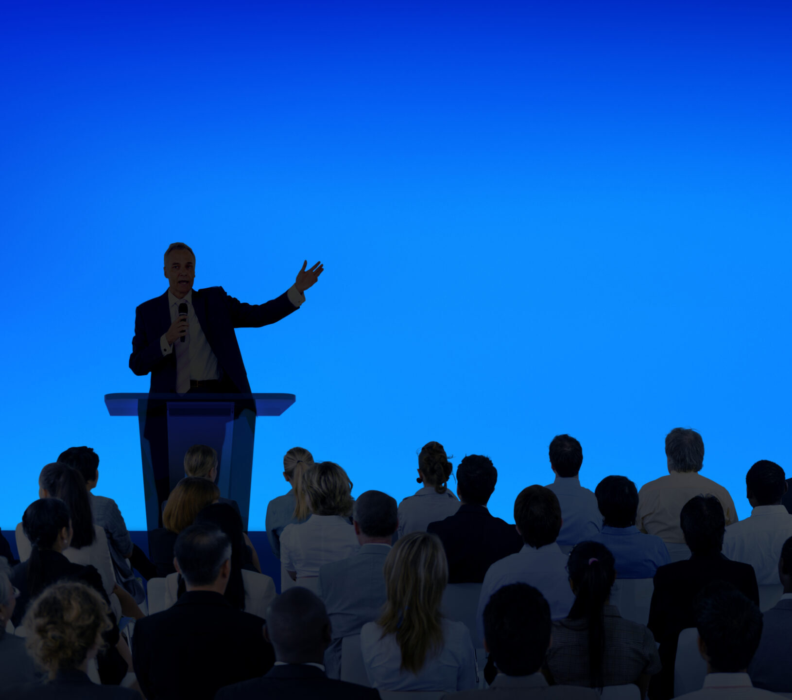 Youth speaker presenting confidently to an audience, symbolizing empowered communication and leadership